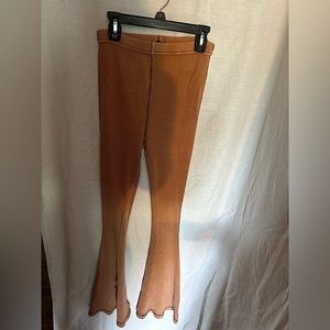 Out from under light pink flair pants